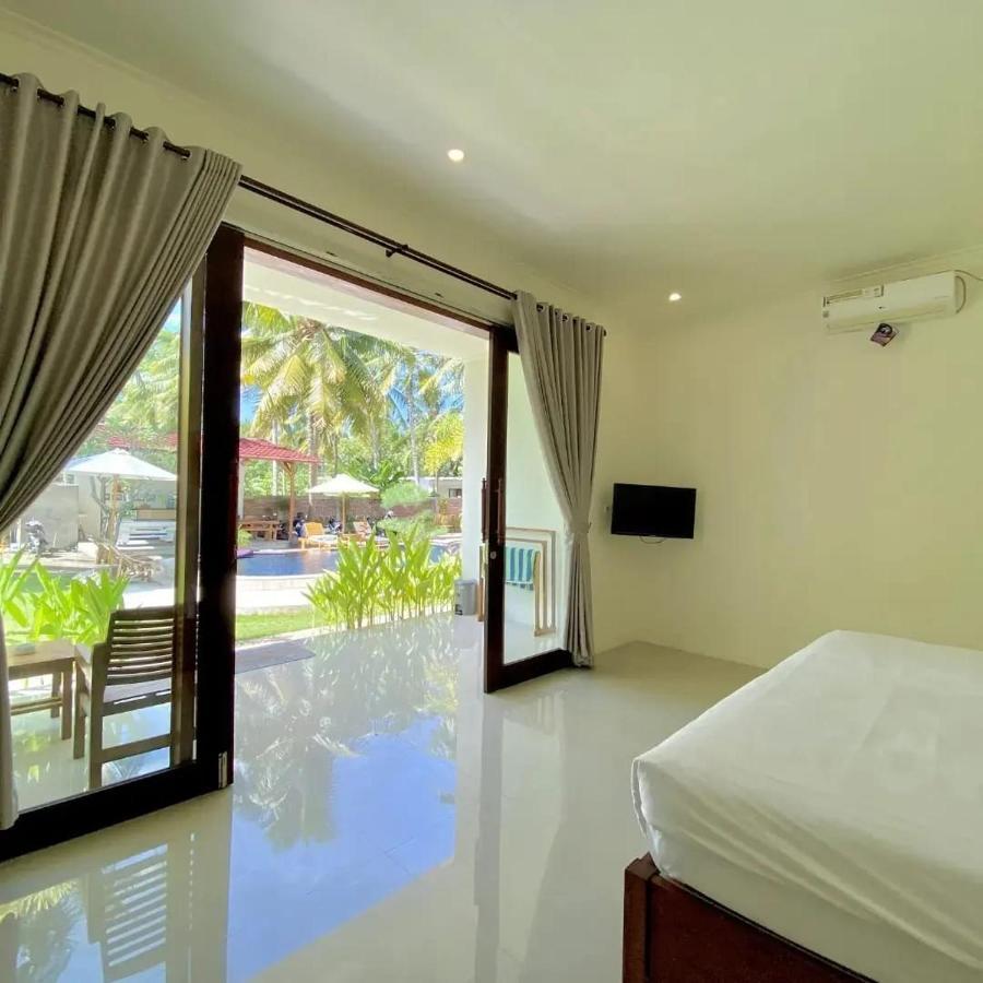 Отель The Kebon Lombok Kuta  Экстерьер фото